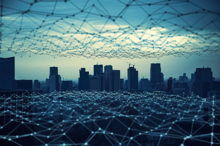 Futuristic cityscape with digital network overlay.